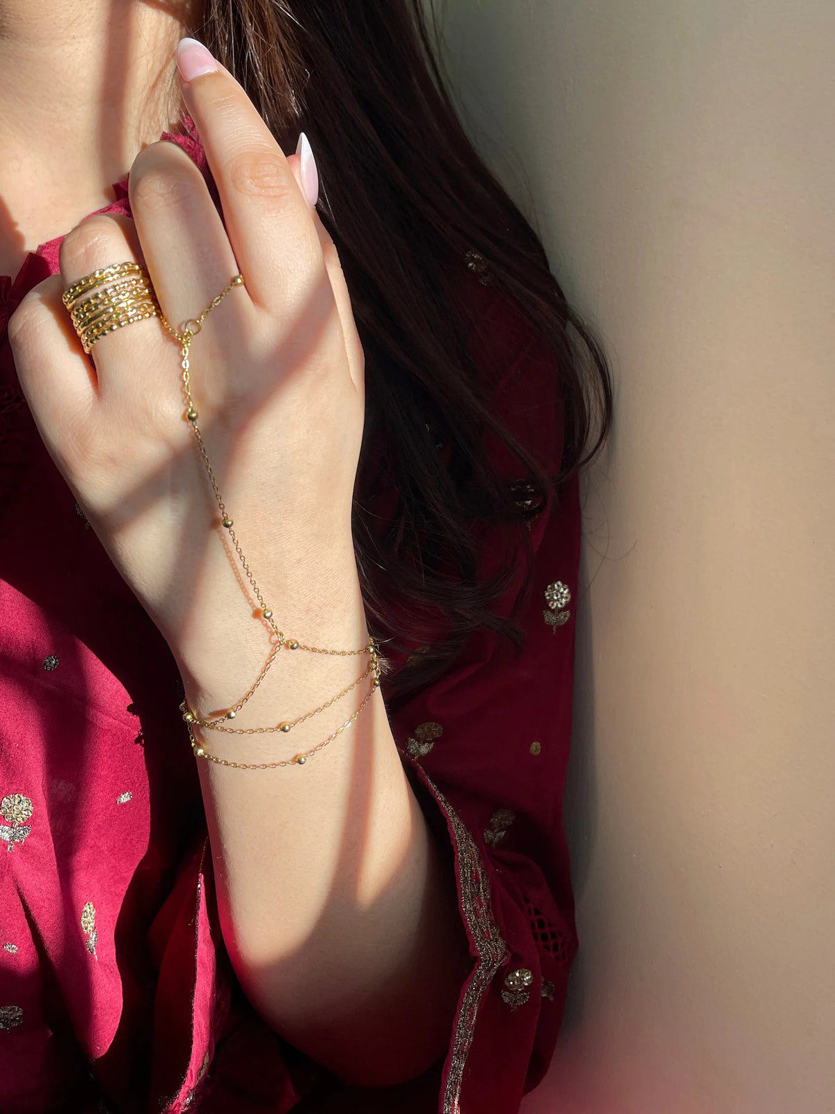 Double layered gold hand chain